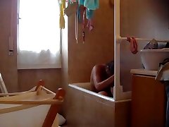 Young sis is spied naked in the bathroom
