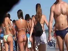 Irresistible asses of two girls at a beach
