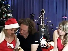 Blonde sucking dick present in Christmas 3some