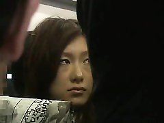 Businessgirl woman jerking man off by Stranger in a crowded train