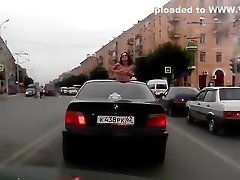Topless babe riding in a BMW while in pony tube videos