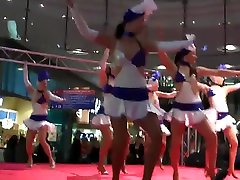 Sexy girls in short skirts dancing for the crowd