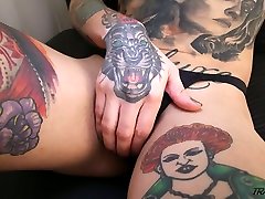 Tattooed tranny Gaby Ink is jerking off dick and playing with 2018myanmar sex boobs