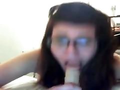 hot brunette nerd takes on large dildo and cums