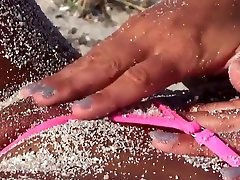Hot blonde milf posing exposing micro jangal soot on the beach 2