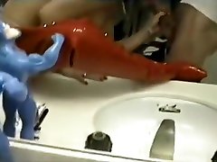 Hillary Daniels Strips Off Her Red Latex Suit & Tastes Her Coochie Juice