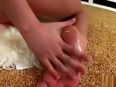 Distinctive blonde teen massages her sexy feet and fingers her pussy