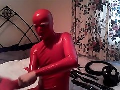 Red Latex shemale webcam stockings with Restraints 1 of 2