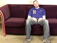 Horny gay hunk masturbates on an interview