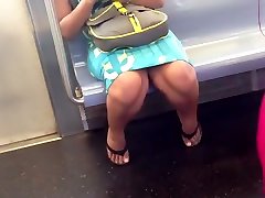 Candid Asian tube slit woman on train