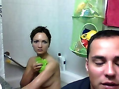Cute Couple having fun bag for money with webcam