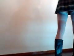 Crossdresser in mini skirt schoolgirl rose da boots.