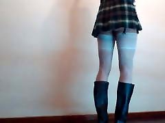 Crossdresser in mini skirt schoolgirl and boots. part 2