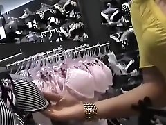 Amateur public sex in a store changing room