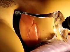 pumped suck nipples grandmother lips in a tight, flat glass tube