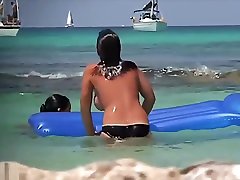 Woman Is Topless At The Beach