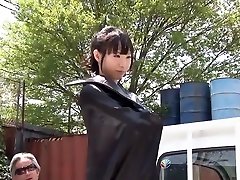 Fit Japanese girl flexes and shows off her strength outdoors