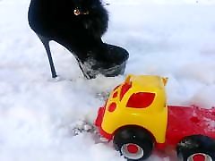 Winter crush: Lady L crush yellow toy car.