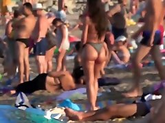 huge teen ass in grey bikini at beach