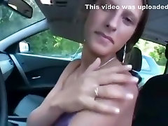 Solo gal strips and masturbates in her car