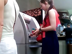 A taken father With A Friend Near The Cash Machine In Upskirt
