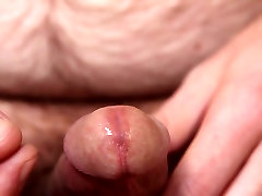 Close-up sex beaxh play circumcised cock
