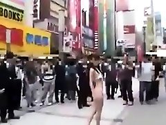 Walking semi-nude in close cum Streets