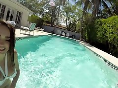 Naughty babe Ashly Anderson is fucked by hot blooded boyfriend by the poolside