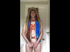 teen jerks off in harness and spirithood, cums in condom