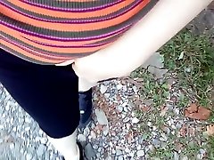 Pee outdoor and titts out in pubblic