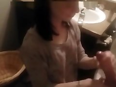 Hand amateur nipple clamps in Toilet