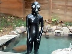 tied up and beaten up in water with gasmask