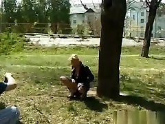Nasty blonde pissing outdoor