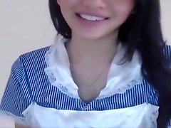 nice asian girl performs in nurse plush flash on webcam