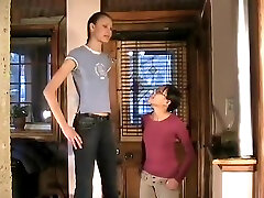 Tall woman in heels compares heights
