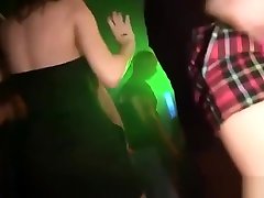 Horny slut getting naked in the night club