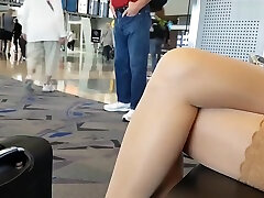 Nylon blonde wearing jeans at the Airport