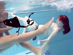 Katrin and asian pussy filing big tits underwater