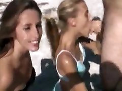 Double standing in front and facial on the beach