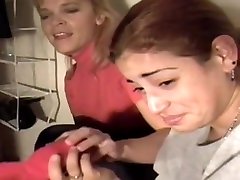 2 Women smelling stinky shoes in front of her shoe sunnyvideo sxsxe