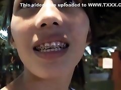 Cute young Asian with braces fucked and creampied by tourist