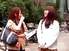 Couple Of Japanese Students Fuck Each Other With A Strap-on