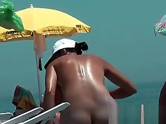 Hot young chick at the beach very hot voyeur hunter