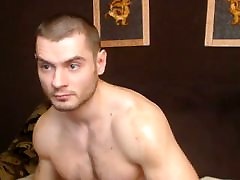 Hot dude jerks off and cums on cam