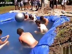 Cool teens play in the swimming-pool