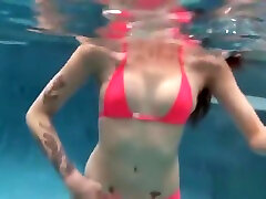 young pink bikini babe strip nude underwater holding breath