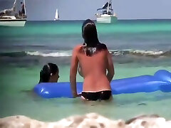 Teen girls having fun on the beach