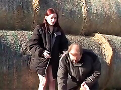 Redhead Gets Plowed In The Field By Bails Of Hay