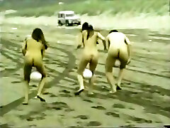 Naked Women Race Across The nursery room With A Ball Between Their