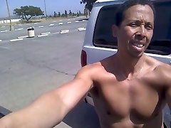 Muscular guy exposing himself in the nude